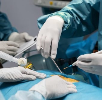 doctors-doing-surgical-procedure-patient-min