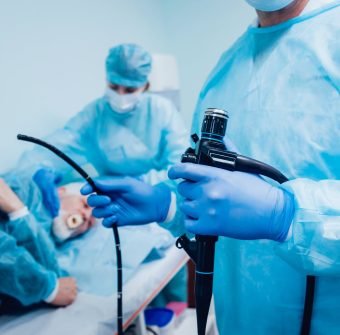 endoscopy-hospital-doctor-holding-endoscope-before-gastroscopy-min